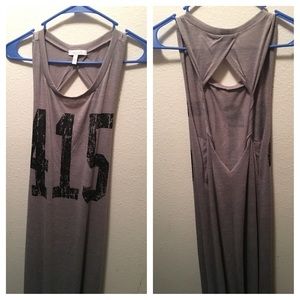 Long grey dress. Open back. Has 415 on the front