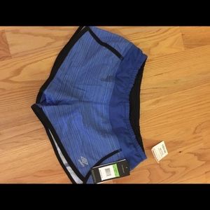 Blue and black athletic/ yoga shorts.