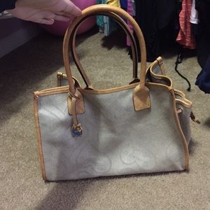 Dooney and Bourke- medium size tan satchel