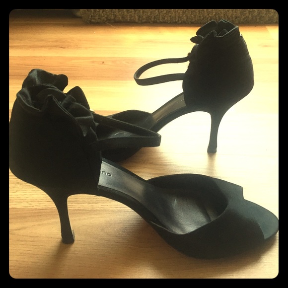 Ruffle back, peel toe heels.