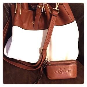 Coach leather wristlet and Wilson leather handbag