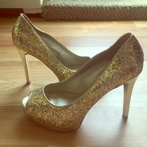 Gold glitter Guess heels.