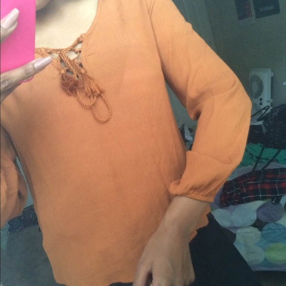beautiful rusty orange  lace up blouse