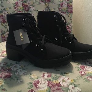 Black canvas lace up combat boots