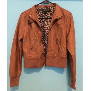 Leather jacket, cheetah print inside