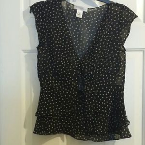 Sheer black with tan polka dots, sleeveless blouse