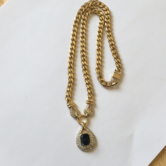 yellow gold tone necklace with blue & white stones