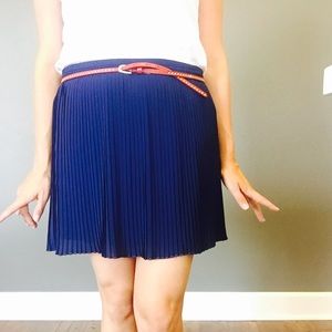 Studded red leather belt.