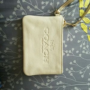AUTHENTIC  creme colored wristlet