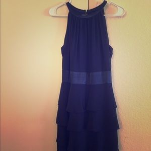 Navy tea-length ruffle dress