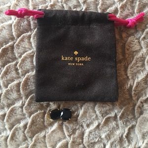 Kate Spade black and gold stud earrings.