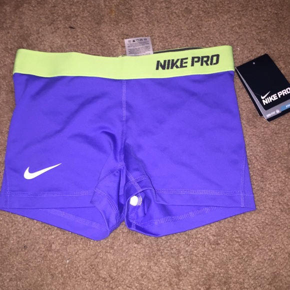 Purple and green Nike pros nwt