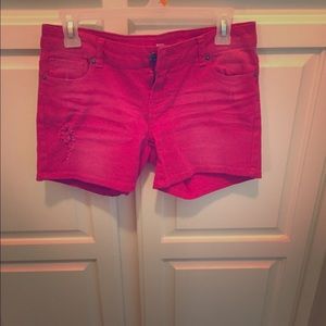 Red distressed shorts
