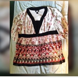 White, black, and pink blouse