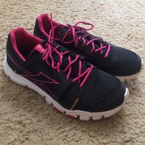 Black and pink running shoes