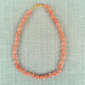 Unique coral colored glass beaded necklace