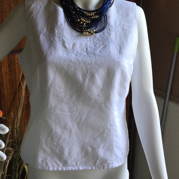 Eyelit white sleeveless blouse