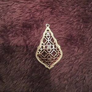 Kendra Scott earring.