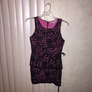 Pink peplum dress with black lace overlay