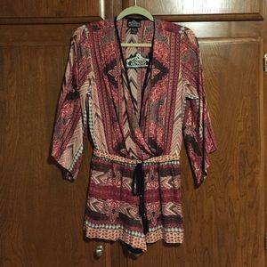 Printed romper, size small, never worn-tags on.