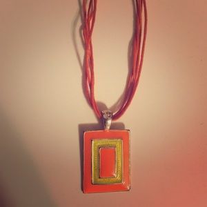 Orange and yellow pendant necklace.