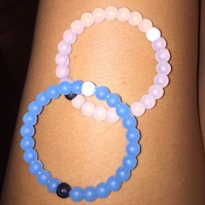 Lokai bracelets (blue and/or clear)