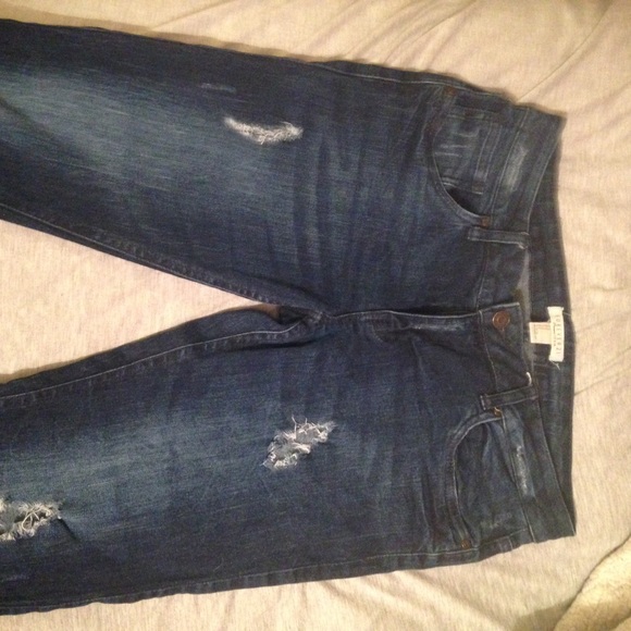 Cute dark denim jeans with natural rips