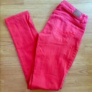 American Eagle coral skinny jeans