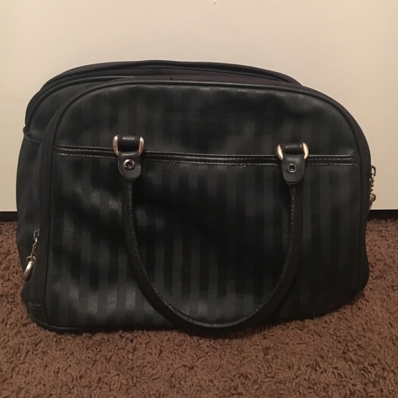 Black purse with multiple pockets.