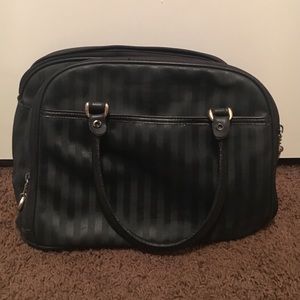 Black purse with multiple pockets.