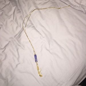 Long gold necklace