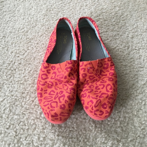 TOMS Orange and Pink Leopard Slip Ons. Size 8