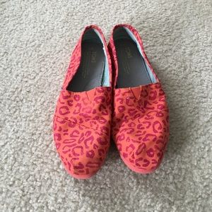 TOMS Orange and Pink Leopard Slip Ons. Size 8