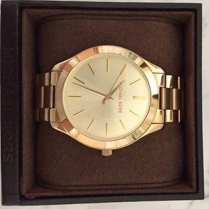 Authentic Micheal Kors gold watch