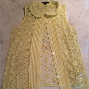 Button-up sleeveless blouse