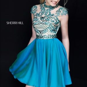Turquoise Sherri Hill homecoming dress.