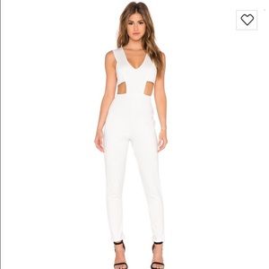 White plunge front jumpsuit.