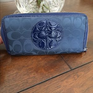 It's a Navy Blue Coach Wallet
