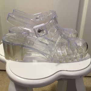 Clear jelly sandals.