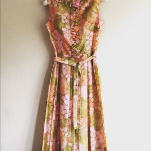 vintage pink dress with belt and ruffle detail