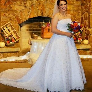 Strapless lace wedding dress with full slip