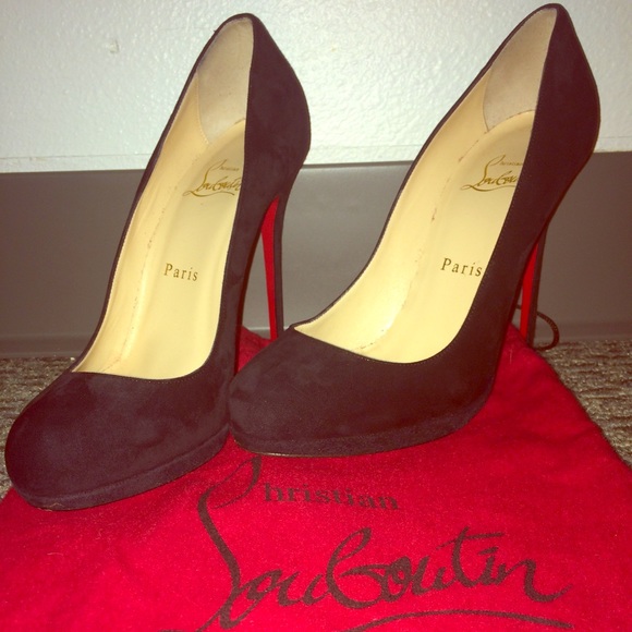 Christian Louboutin's black suede pumps