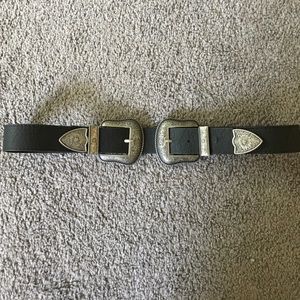 Double buckle belt.