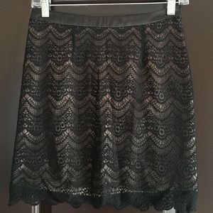 Black lace mini skirt