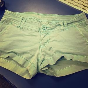 Teal/blue lowrise short shorts.