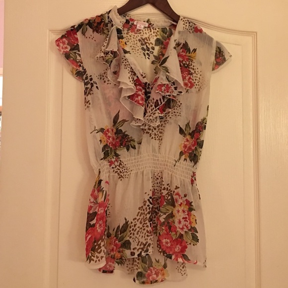 Tan floral and animal print ruffled blouse