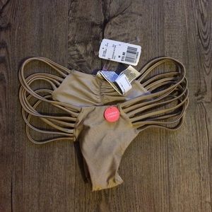 Gold ,cheeky, low rise bikini bottoms. Brand new!