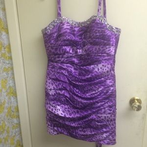 A lavender silk Mori lee by Madeline Gardner dress