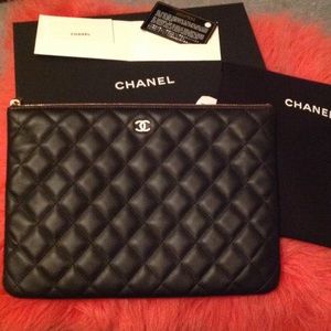 Authentic Chanel Lambskin O'Case Clutch