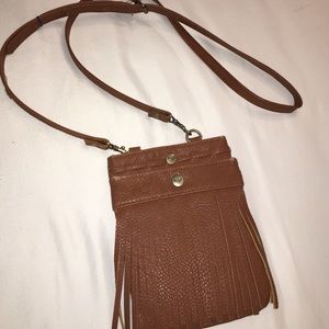 a roxy brown purse its small very stylish